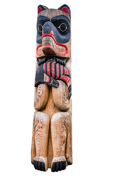 Totem pole with animal and fish isolated