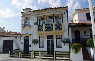 colorful houses of costa nova in portugal