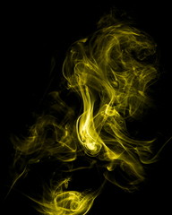 Yellow smoke on black background