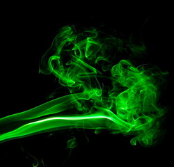 Fototapeta premium Green smoke on black background