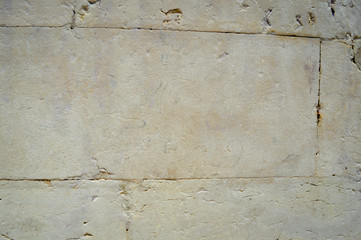 Closeup of natural pattern of stone wall building textured background.