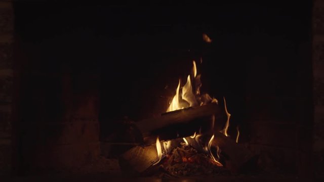 Wood Fire Burns Brightly in Fireplace with Sound