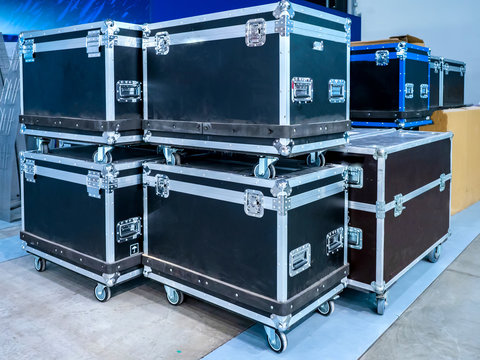 Concert equipment transportation. Boxes on wheels. Boxes with metal edging. Storage equipment. Container on wheels.