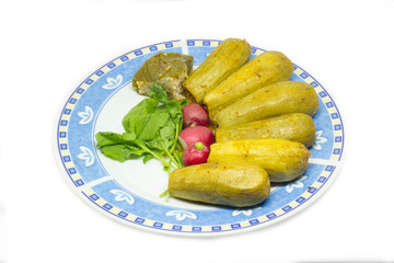 A dish of stuffed zucchini Isolated on white background.