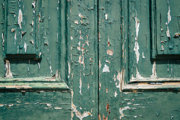 Old woden door textured grungy background, closeup.