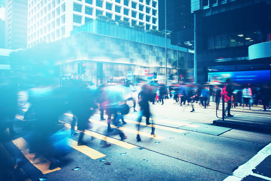 Walking People On The Busy City Street With Sunlight Effect