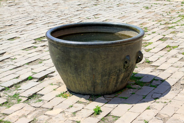 Fototapeta premium Copper cylinder in broken ground in the Eastern Royal Tombs of the Qing Dynasty, china