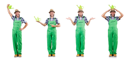 Young cheerful gardener with watering can isolated on white