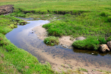 small river in the WuLanBuTong grassland, China