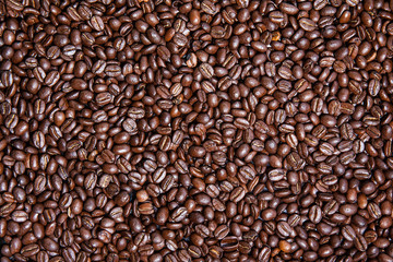 Horizontal background of roasted Colombian coffee beans