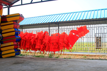 inflatable boats and life jackets heaped in the drifting playground, Xilin gol league, China © junrong