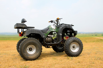 four wheels motorcycle on the grassland