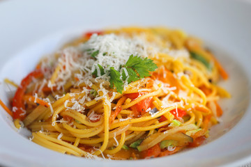 Macro photo of delicious spaghetti with vegetables