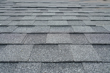 close up on new installed roof shingle 