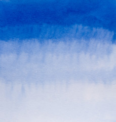 Fototapeta premium Blue watercolor background on paper