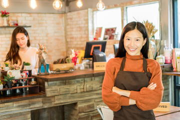 Asian woman as café owner in restaurant success 