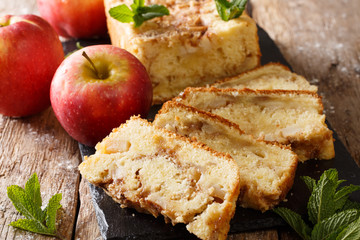 Delicious homemade apple bread with cinnamon and mint close-up. horizontal