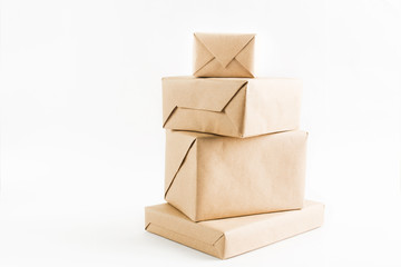 Stack of craft wrapped boxes for delivery
