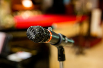 black microphone on the stage