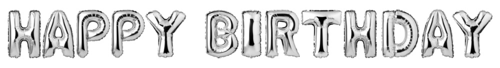 Upper case letters HAPPY BIRTHDAY from silver balloons