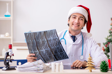 Doctor on the shift on christmas eve