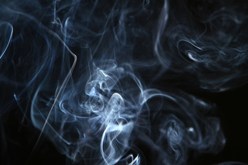 Obraz premium amazing swirl light bright smoke on the dark background.