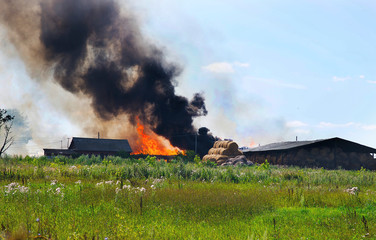 Fototapeta na wymiar fire in an agricultural haystack