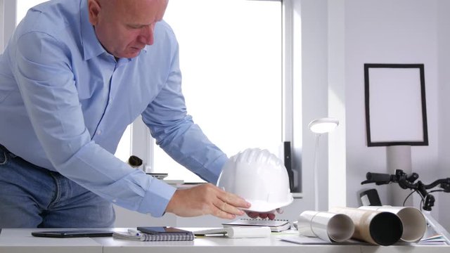 Tired Engineer Coming to Office Take Out Hardhat and Gesturing Worried
