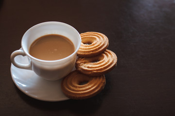 Cup of coffee and biscuits