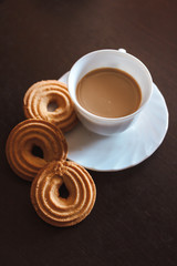 Cup of coffee and biscuits