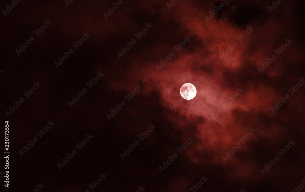 Wall mural full moon with red clouds in the night sky