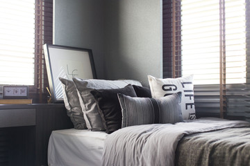 Interior of gray and white cozy bedroom