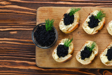 Toastes with black caviar. Spase for text or design.