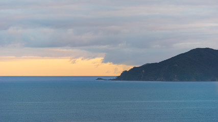 Land ocean and the sky meet at the horizon