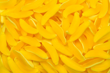 Yellow banana gummy candies. Top view. Jelly  sweets.