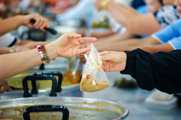 People who are rich and mentally assisting people in society, sharing food for the hungry : Help and Donation Concepts