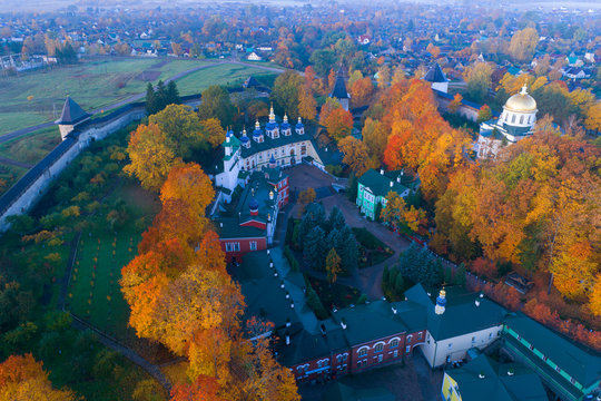 October morning over the Holy Dormition Pskovo-Pechersky Monastery (aerial photography). Pechory, Russia