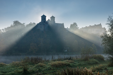 Tyniec abbey in the mists, sunny morning, Krakow, Poland