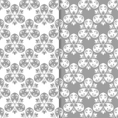 White and gray set of floral seamless patterns