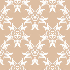 White floral seamless design on beige background