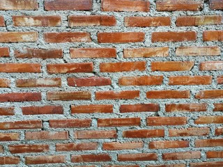 Fฺull frame shot of red brown brick wall as background, vintage style