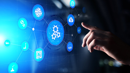 Automation of business and industrial manufacturing process. Technology innovation and software development concept on virtual screen.