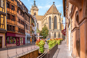 Cityscaspe view on the old town with saint Martin cathedral in Colmar, famous french town in Alsace region