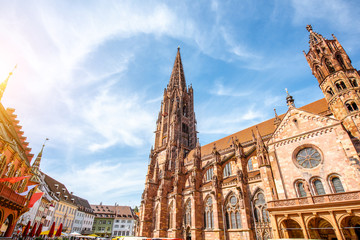 View from below on the main cathedral in the old town of Freiburg, Germany