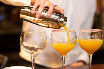 Barman preparing a cocktail