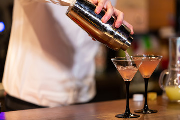 Barman preparing a cocktail