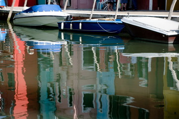Fototapeta na wymiar Colorful houses and boats on Burano Island