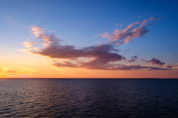 Naklejka premium colorful dramatic sunrise in the sea. view from ferry