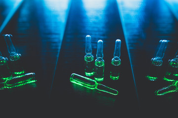liquid drug production concept. artistic dark filter. low key photo