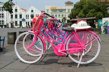 Fototapeta na wymiar The colorful bicycles at Kota Tua (Old Town), a major tourist attraction in the city
